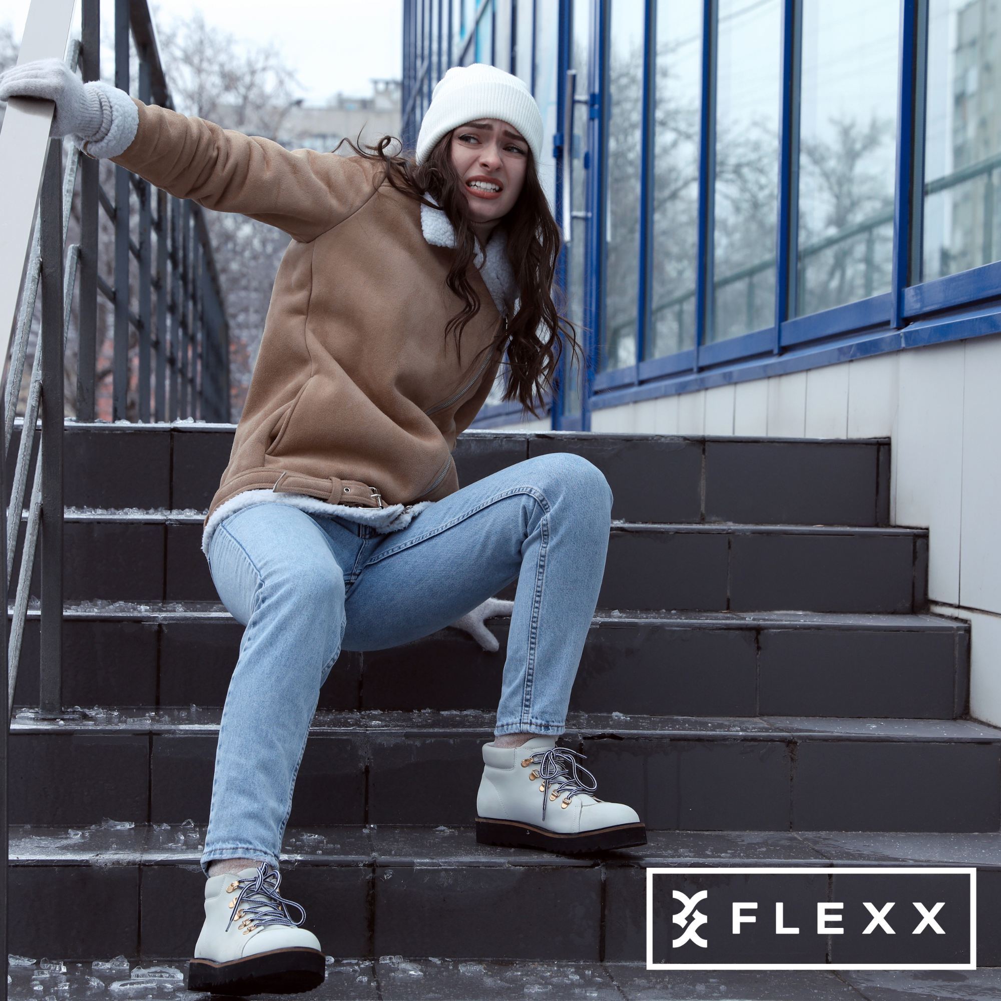 Woman slipping on icy stairs during winter
